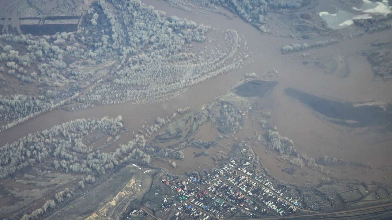 An aerial picture taken from a plane shows a flooded area near the city of Orenburg