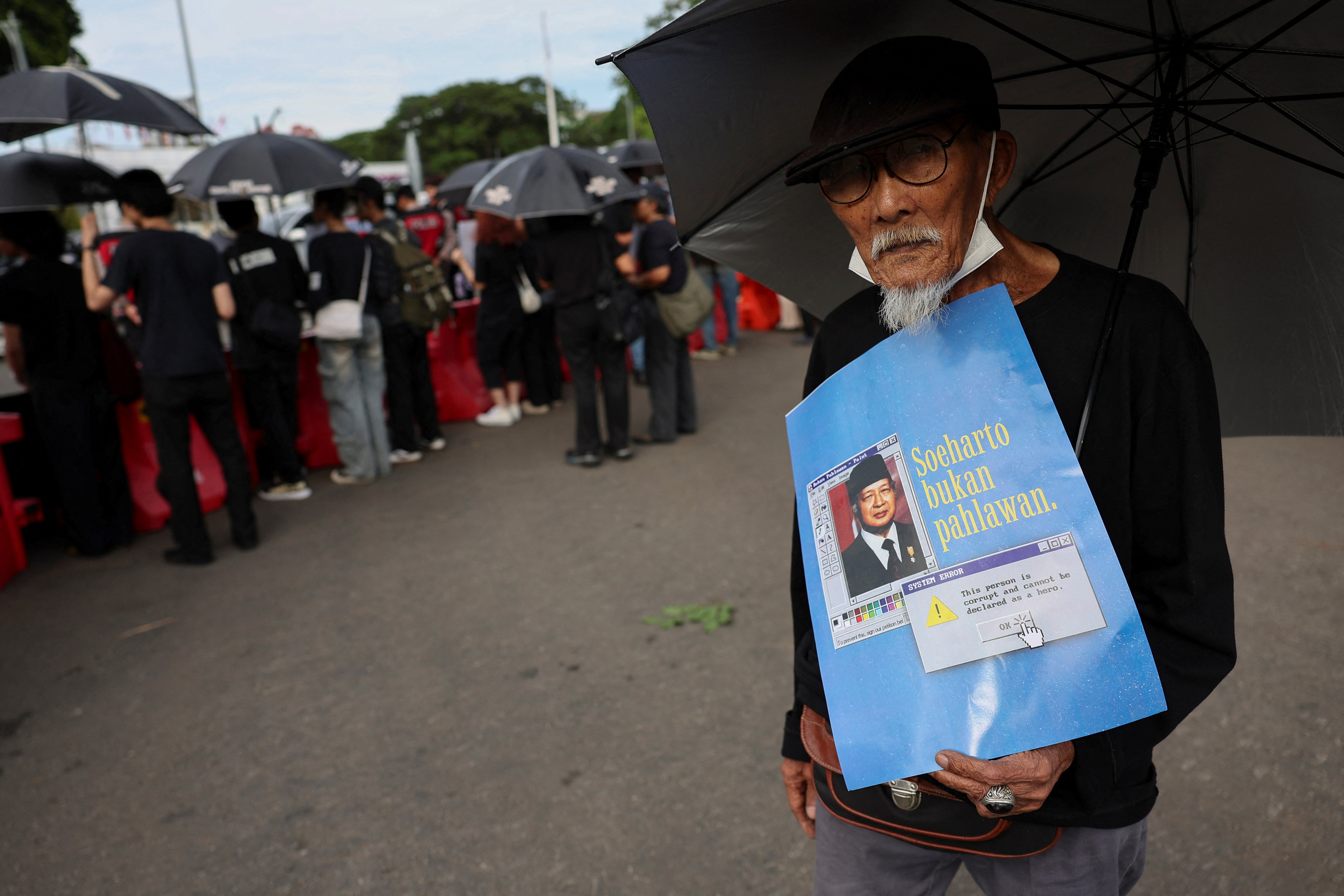 Protest against the government's plans to name late president Suharto a national hero, in Jakarta