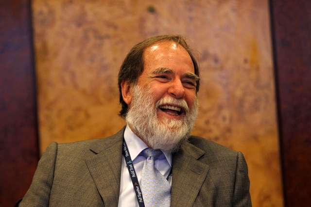 De Beers chairman Nicky Oppenheimer smiles during an interview with Reuters at the diamond producer's headquarters in London