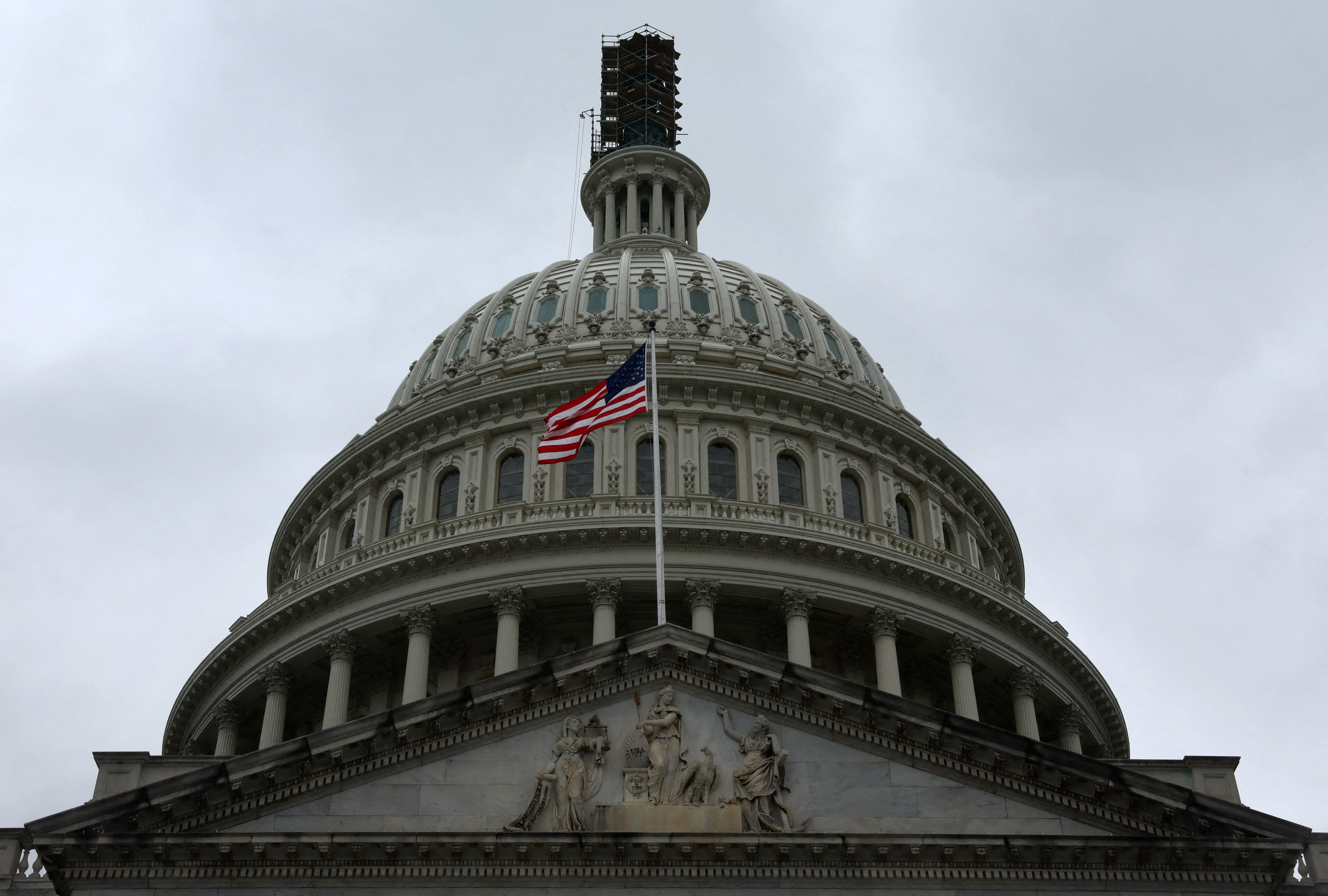 The dome of the U.S. Capitol building is seen on a rainy day in Washington