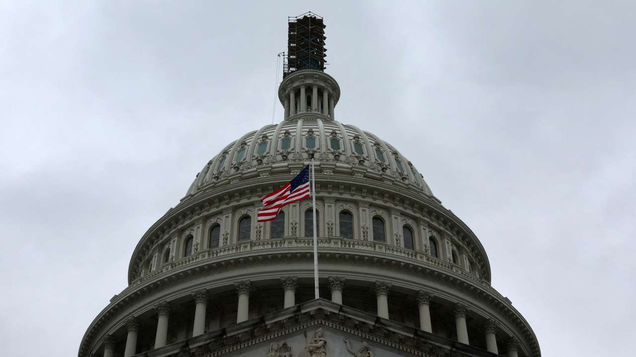 The dome of the U.S. Capitol building is seen on a rainy day in Washington