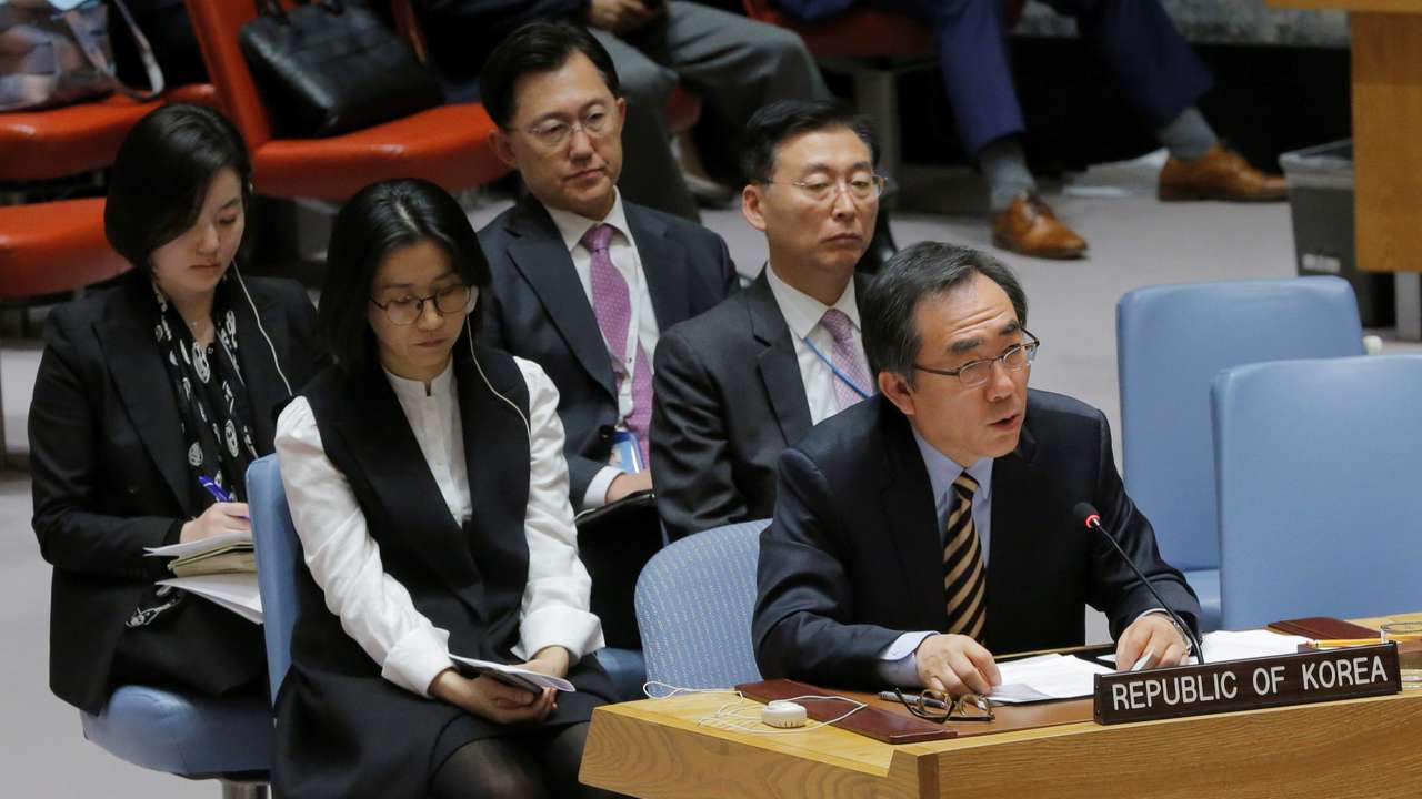 South Korean ambassador to the United Nations (UN) Cho Tae-yul (L) speaks during a meeting of the UN Security Council to discuss a North Korean missile launch at UN headquarters in New York
