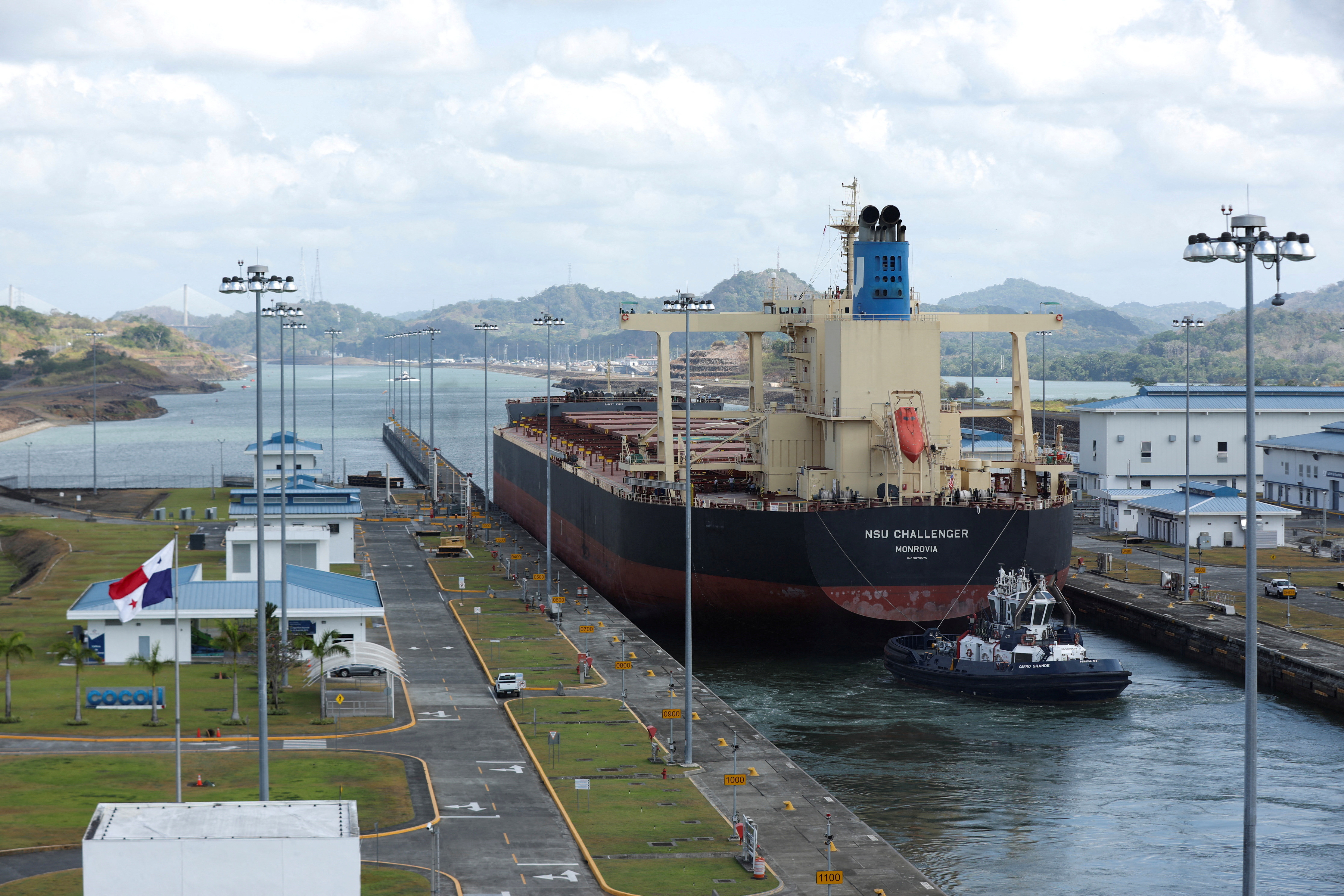 FILE PHOTO: Cargo vessels transit through the Panama Canal, on the outskirts of Panama City