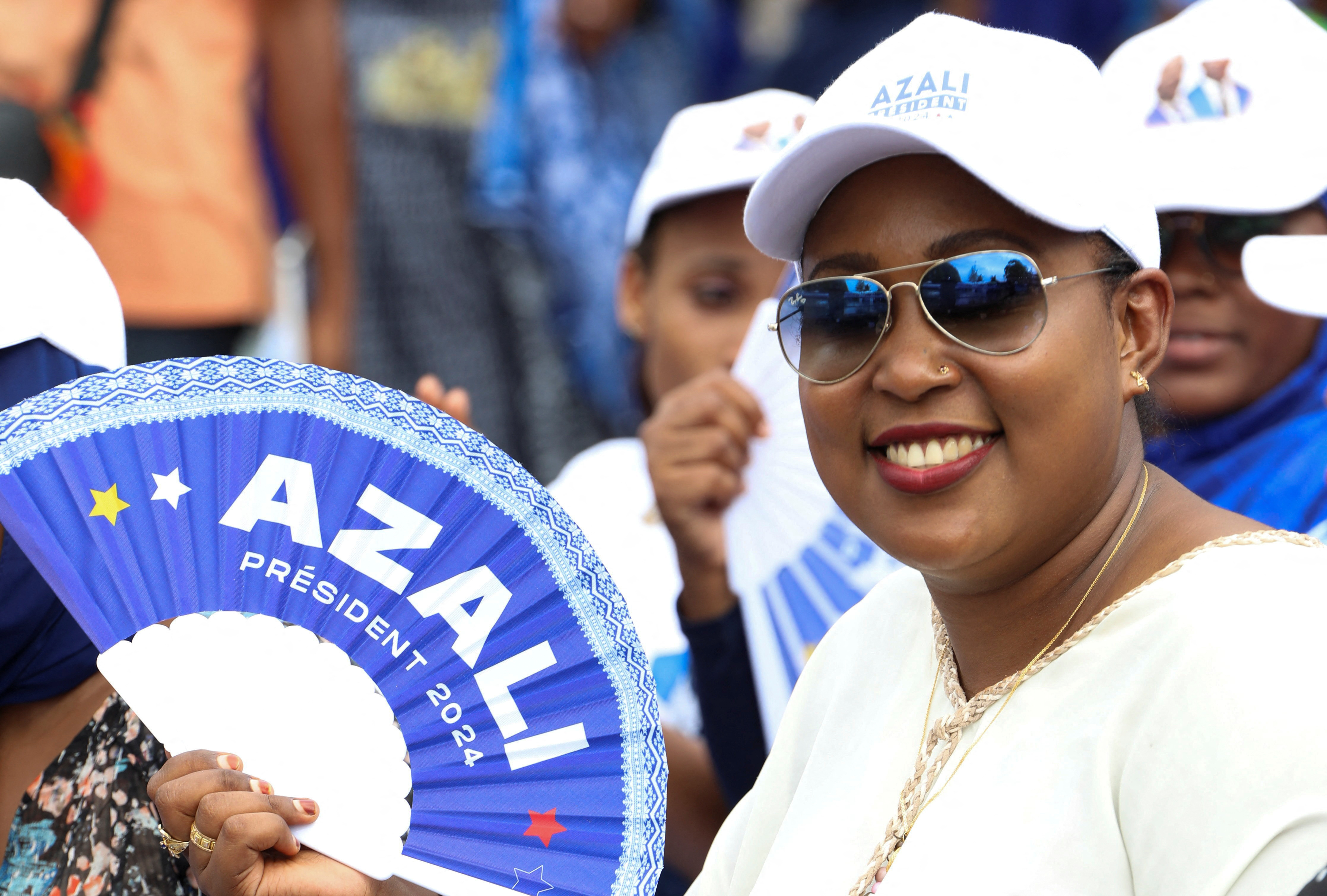 A supporter of Comoros' President Azali Assoumani attends his political rally ahead of the presidential election outside Moroni