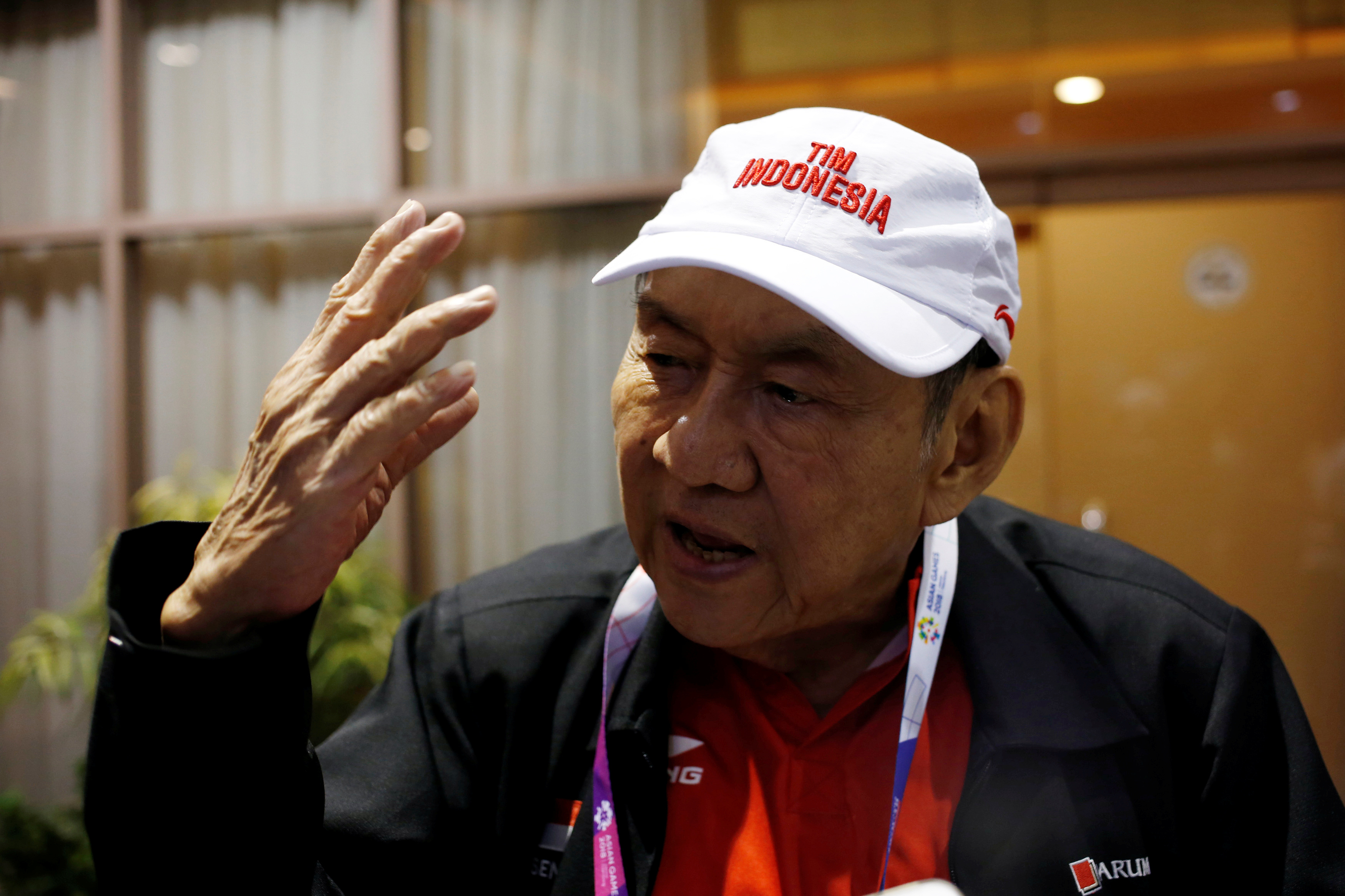 Indonesian billionaire Michael Bambang Hartono speaks during an interview about the 2018 Asian Games bridge competition in Jakarta