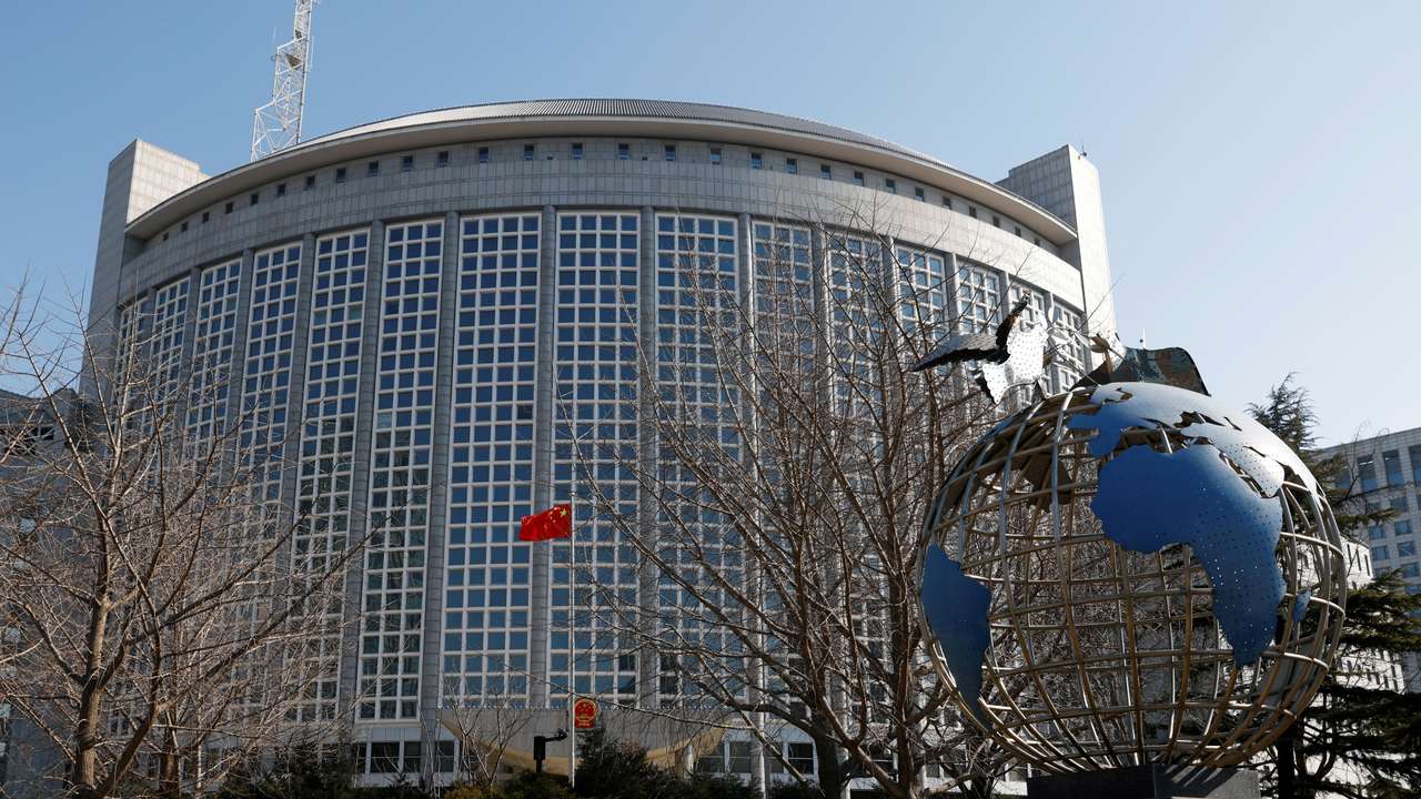 FILE PHOTO: Chinese flag flutters outside the foreign ministry in Beijing