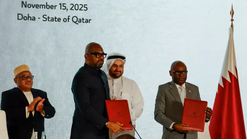 Representatives of the Democratic Republic of Congo and the M23 rebel group sign a framework agreement during a ceremony in Doha