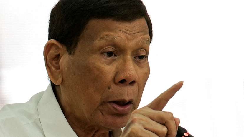FILE PHOTO: Former Philippine President Rodrigo Duterte attends the House Quad Committee hearing at the House of Representatives, in Quezon City