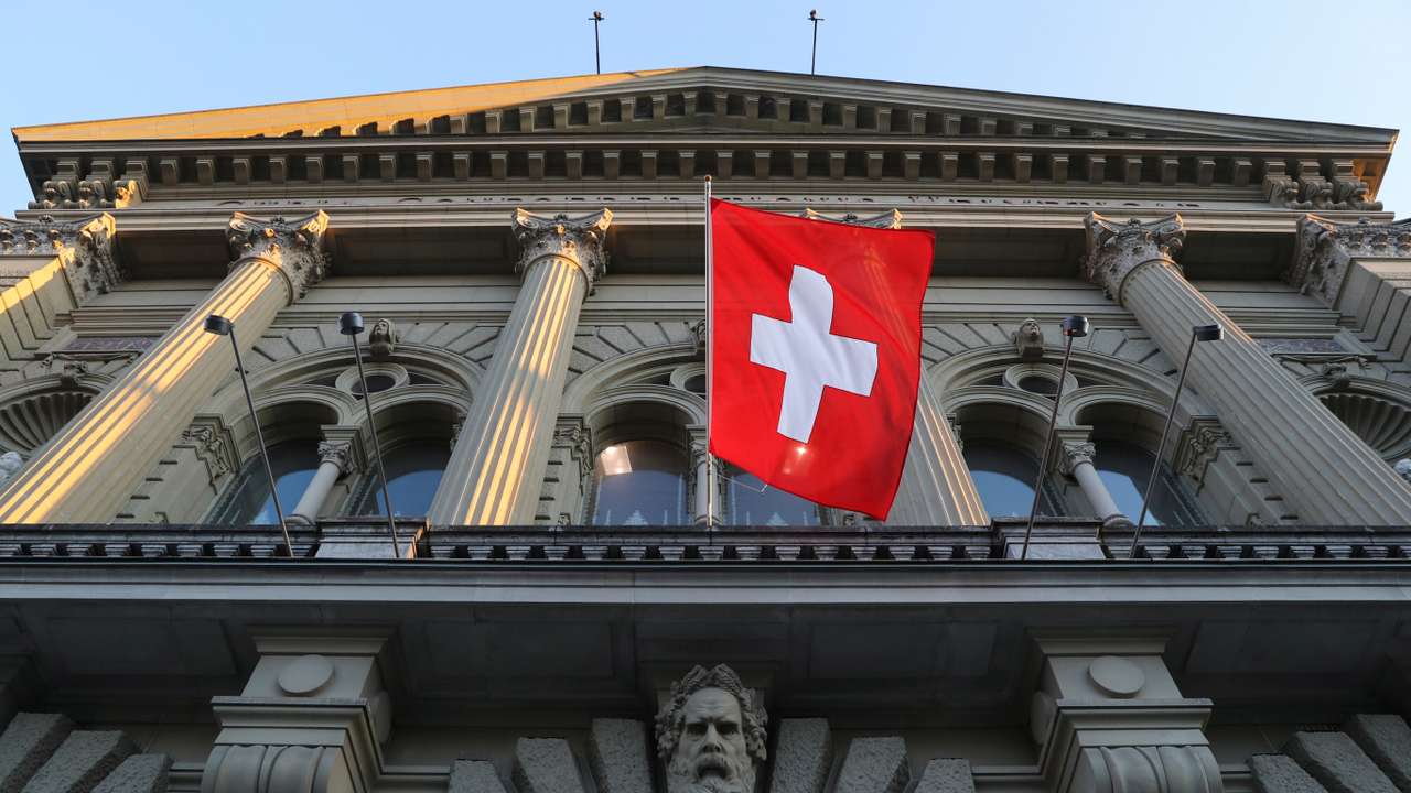 Switzerland's national flag flies at the Swiss Federal Palace in Bern