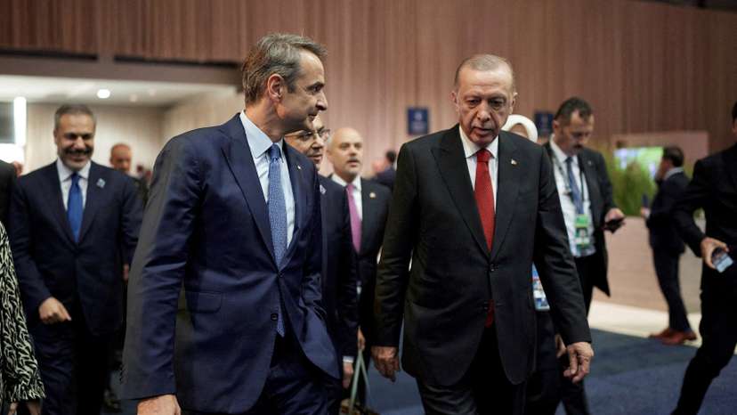 FILE PHOTO: Turkey's Erdogan, Greece's Mitsotakis meet on NATO Summit sidelines