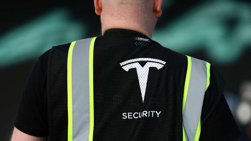 Tesla's Gigafactory halts its production after a suspected arson attack, in Gruenheide