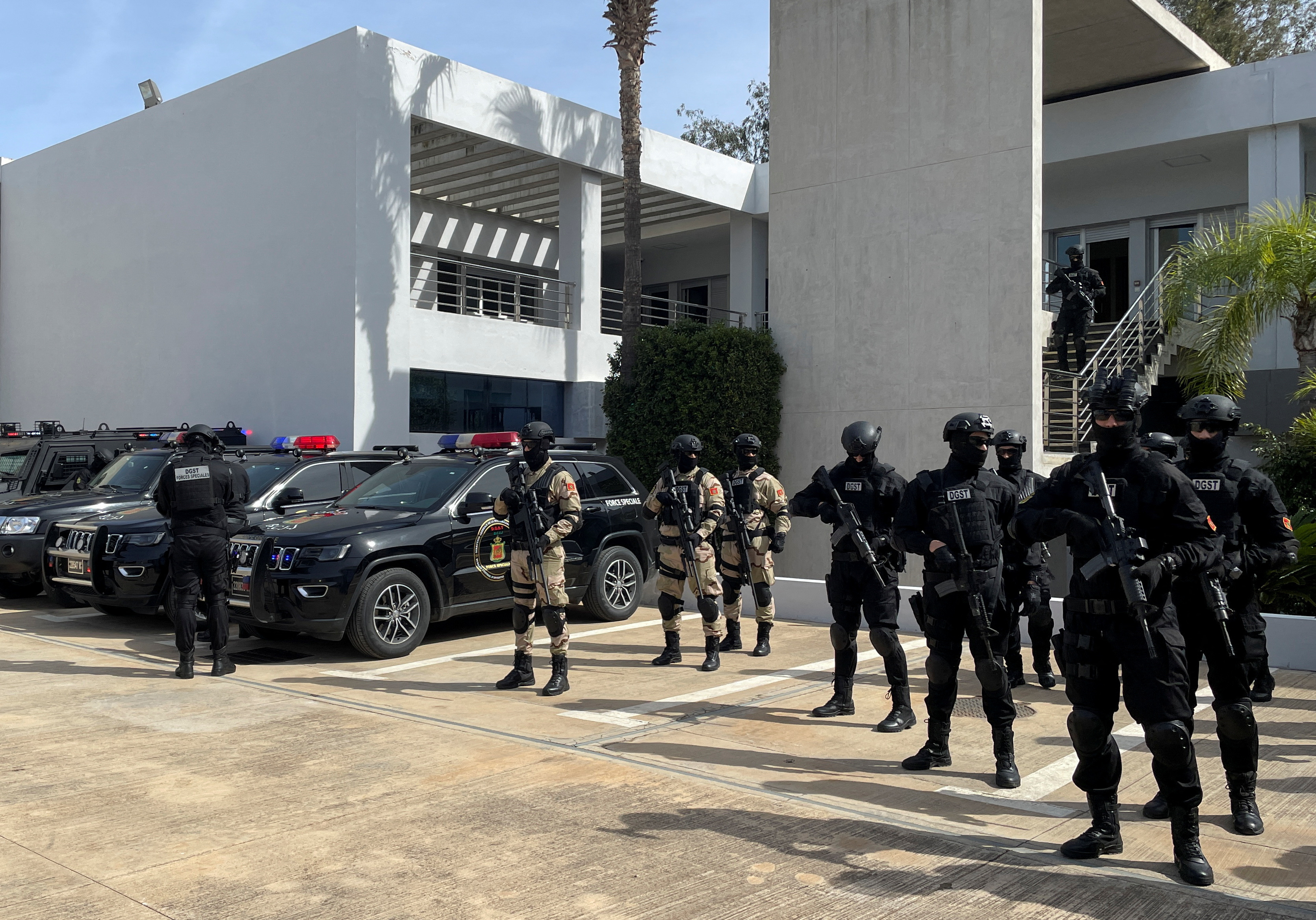 Morocco security forces stand guard at the Central Bureau of Judicial Investigations (BCIJ) headquarters in Sale