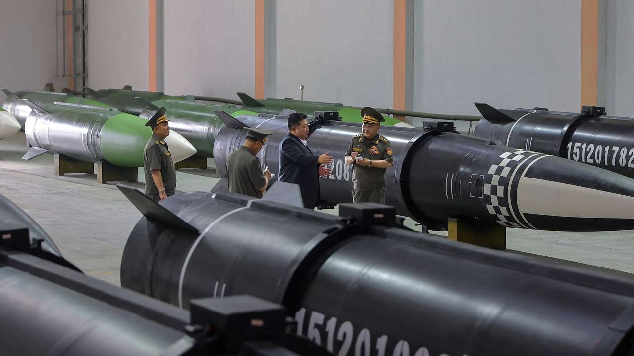 North Korean leader Kim Jong Un inspects a new missile production line at a military enterprise