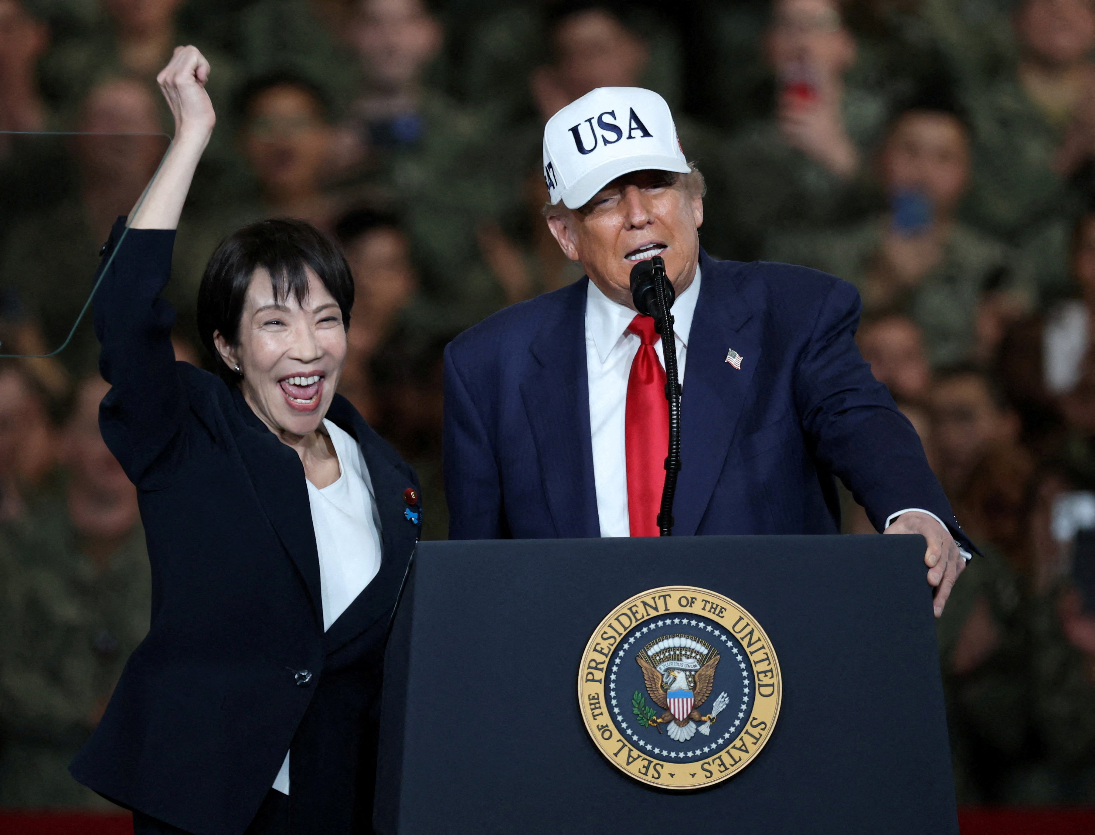 U.S. President Donald Trump and Japanese Prime Minister Sanae Takaichi visit the U.S. Navy's Yokosuka base in Yokosuka