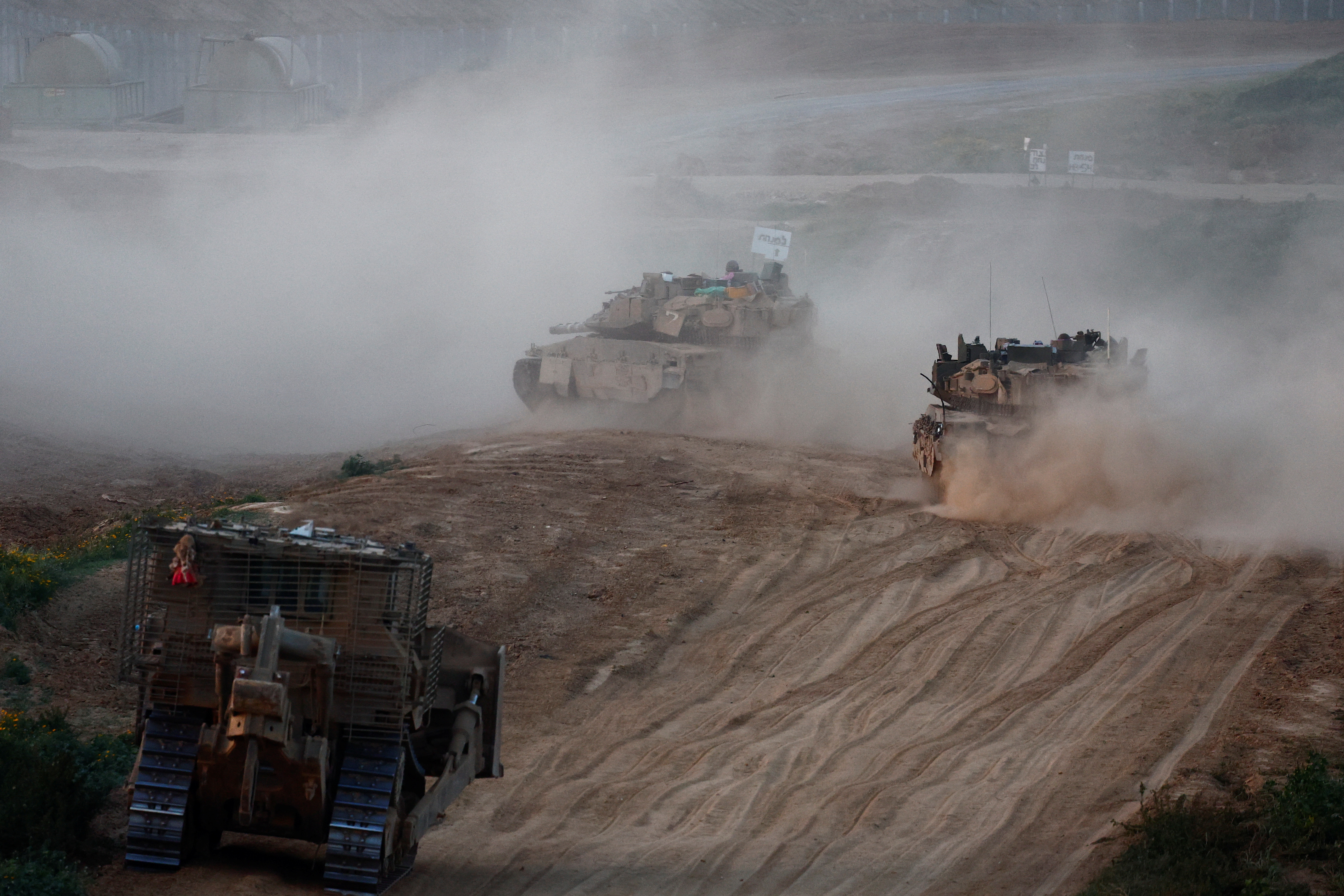 A convoy enters Gaza, amid the ongoing conflict between Israel and Palestinian Islamist group Hamas, in Southern Israel