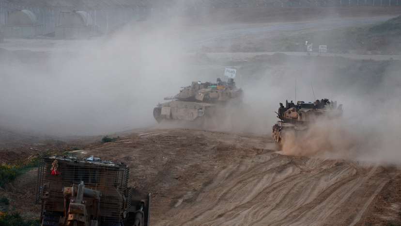 A convoy enters Gaza, amid the ongoing conflict between Israel and Palestinian Islamist group Hamas, in Southern Israel