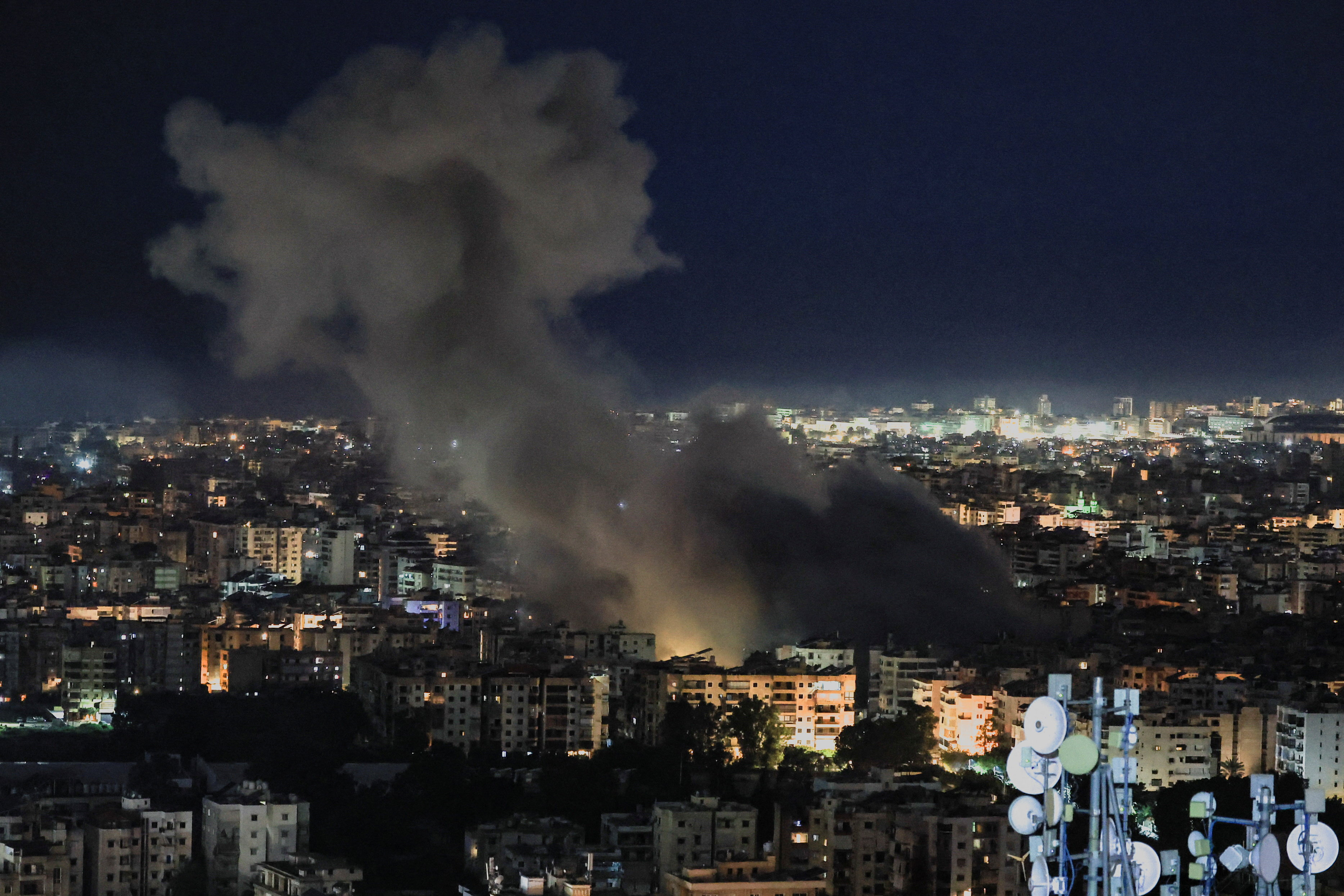 Smoke billows following strikes on Beirut’s southern suburbs, as seen from Baabda