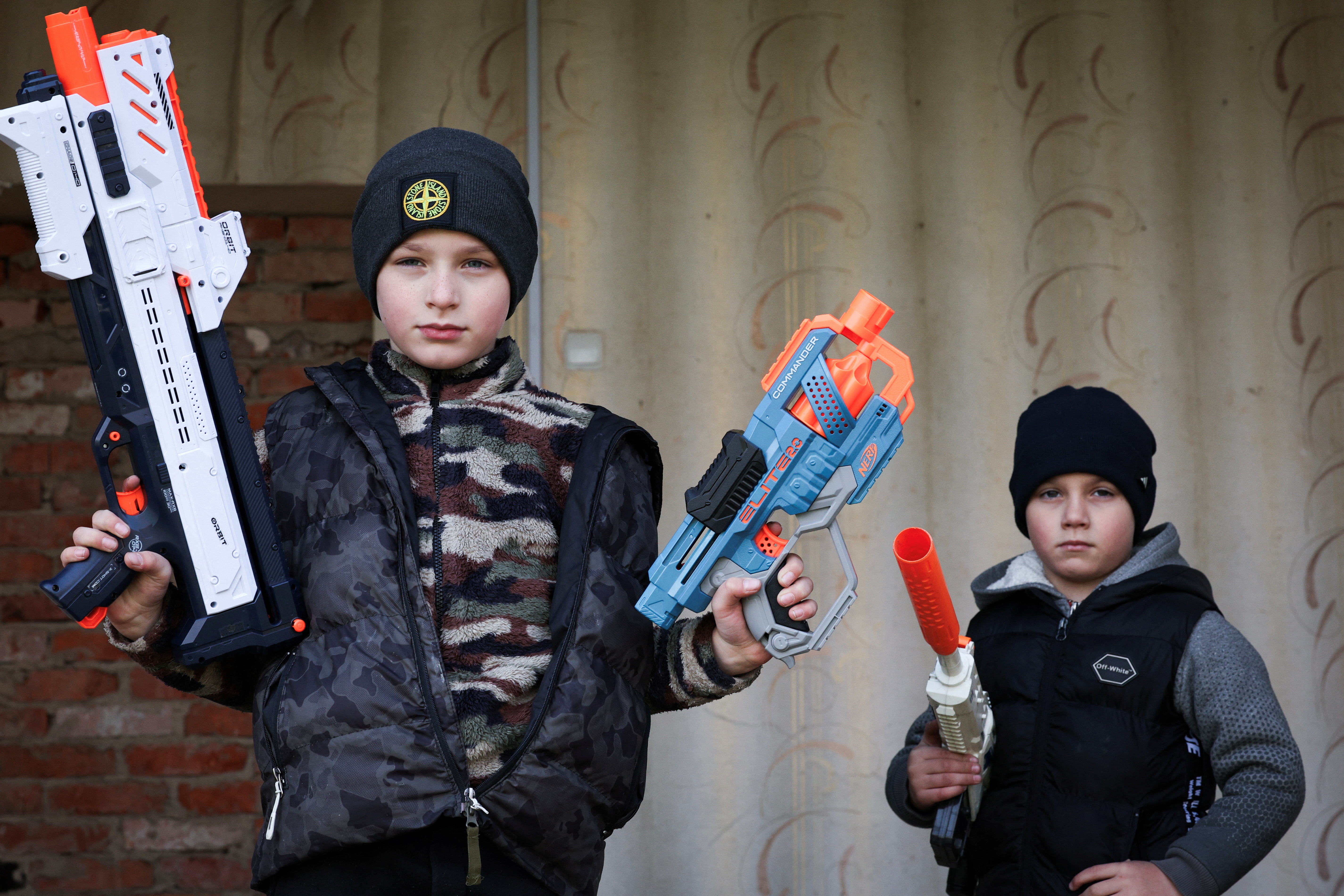 The Wider Image: Childhood shaped by war for two Ukrainian brothers