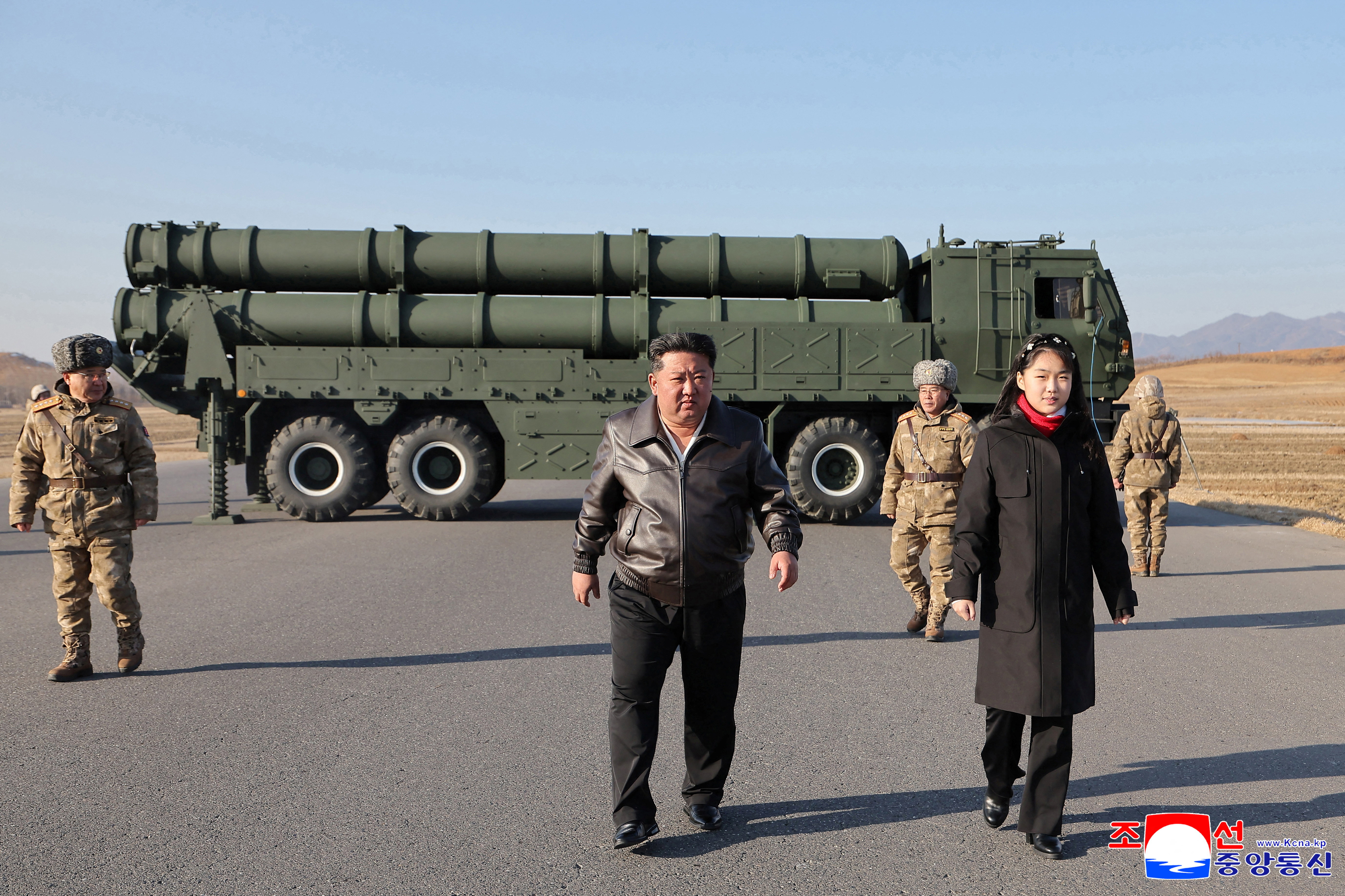 North Korean leader Kim Jong Un directs test of large-caliber multiple-rocket launch system