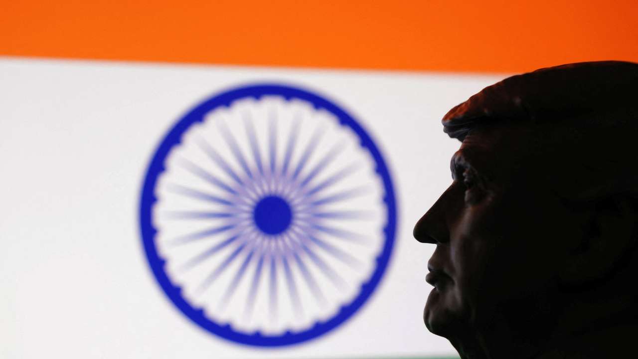 Illustration shows 3D-printed miniature model of U.S. President Donald Trump, Indian flag