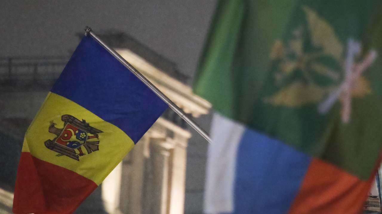 The state flag of Moldova flies outside the country's embassy in Moscow
