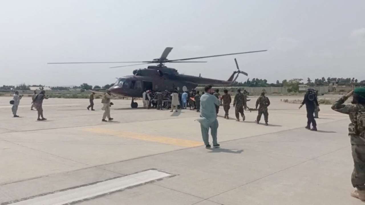 A helicopter carrying casualities lands at Nangarhar airport, in Jalalabad