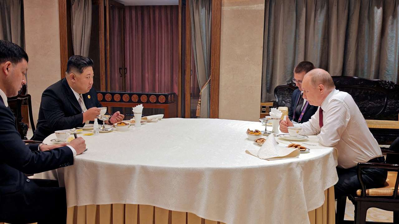 FILE PHOTO: North Korean leader Kim Jong Un meets Russian President Vladimir Putin in Beijing