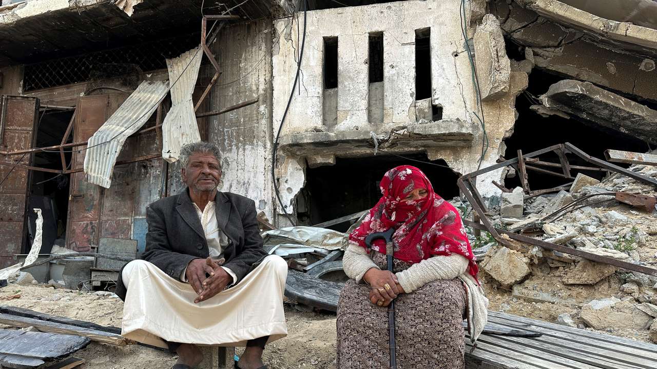 A Palestinian family returns to Khan Younis after Israeli forces withdrew from the city, southern Gaza Strip