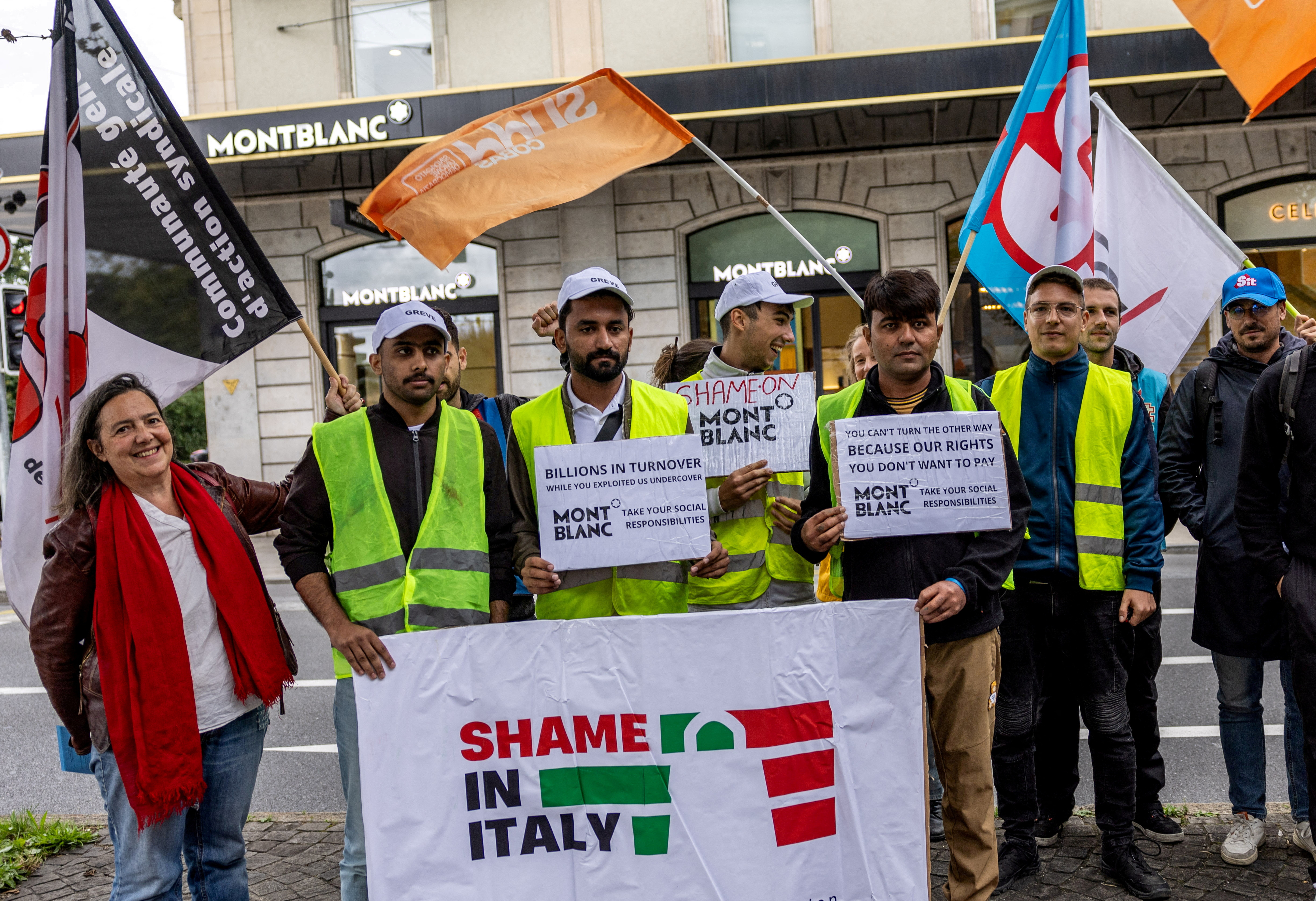 Italian contractors of Montblanc demonstrate outside the brand’s shop in Geneva