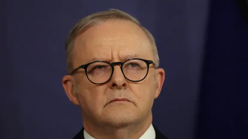 FILE PHOTO: Australian Prime Minister Anthony Albanese reacts during a press conference in Sydney