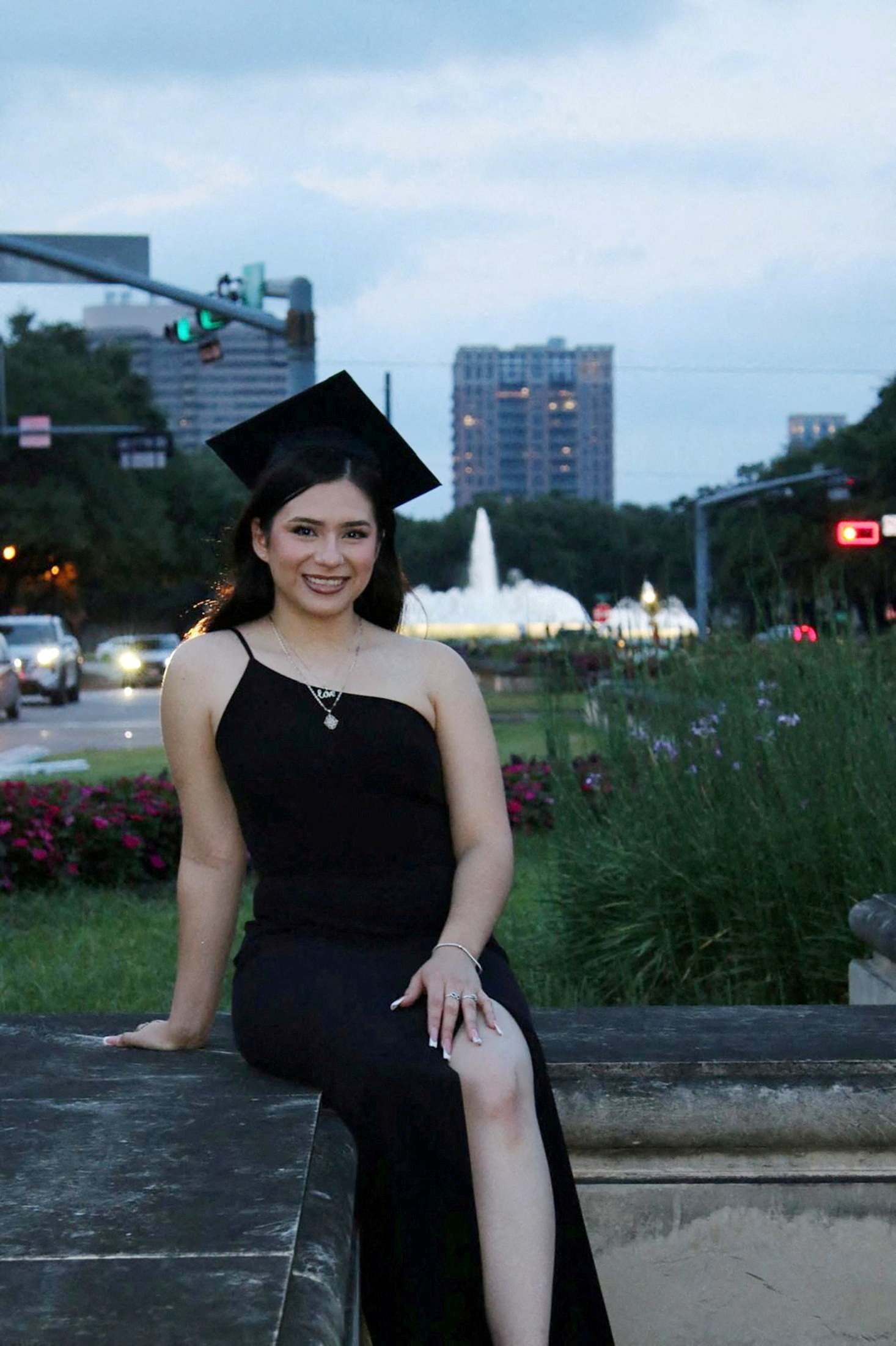 FILE PHOTO: Babson College student Any Lucia Lopez Belloza poses wearing a mortarboard after graduating from high school in Boston