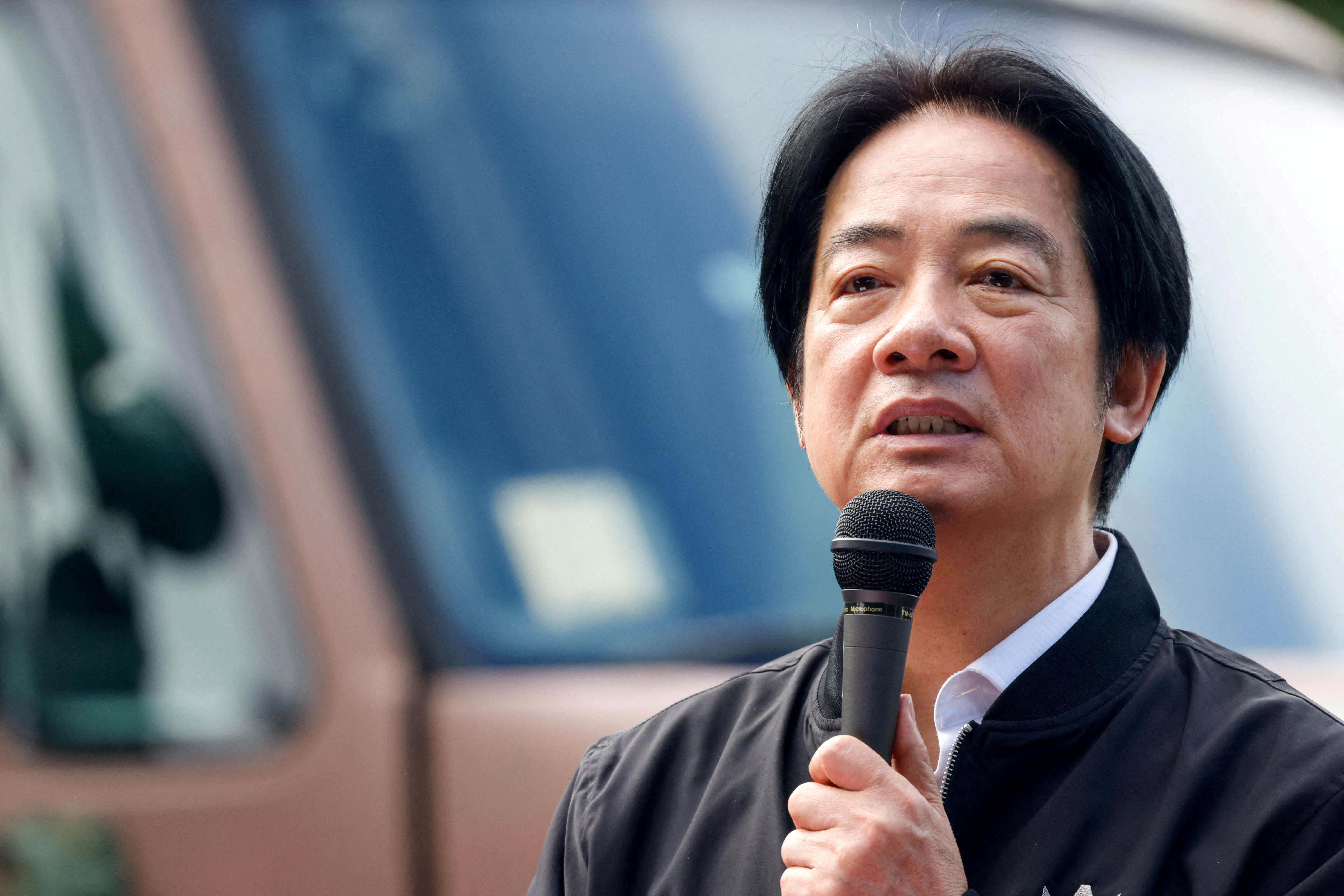 FILE PHOTO: Taiwan President Lai Ching-te inspects reservists during a training session at Loung Te Industrial Parks Service Center in Yilan