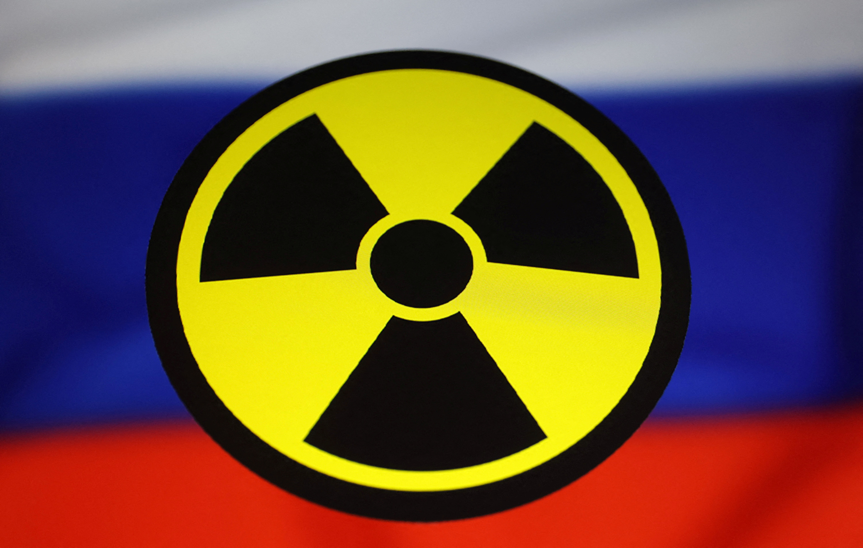 Illustration shows Russian flag and nuclear sign