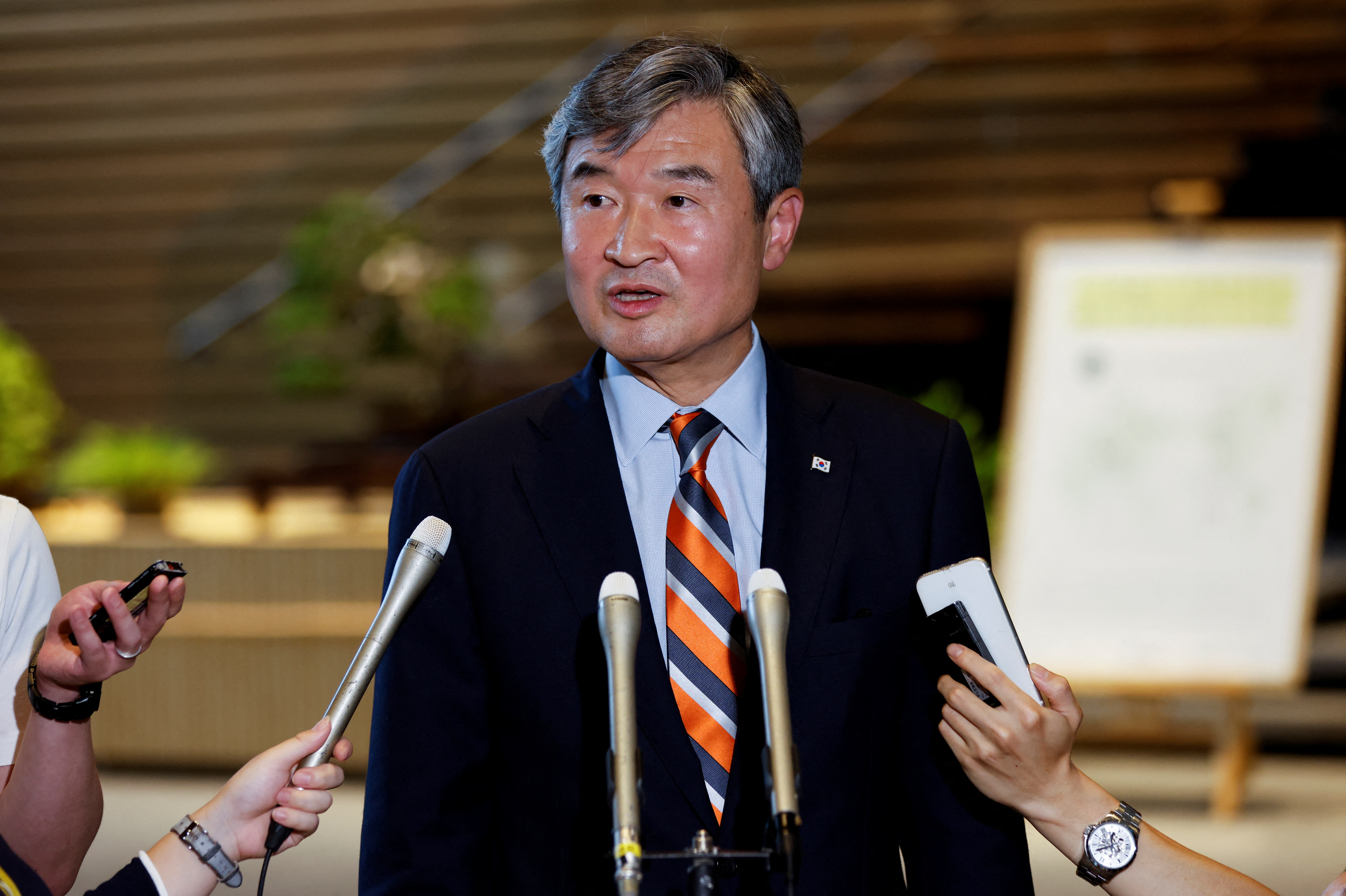 South Korea's national security adviser Cho Tae-yong speaks to the media after meeting with Japanese Prime Minister Fumio Kishida, in Tokyo