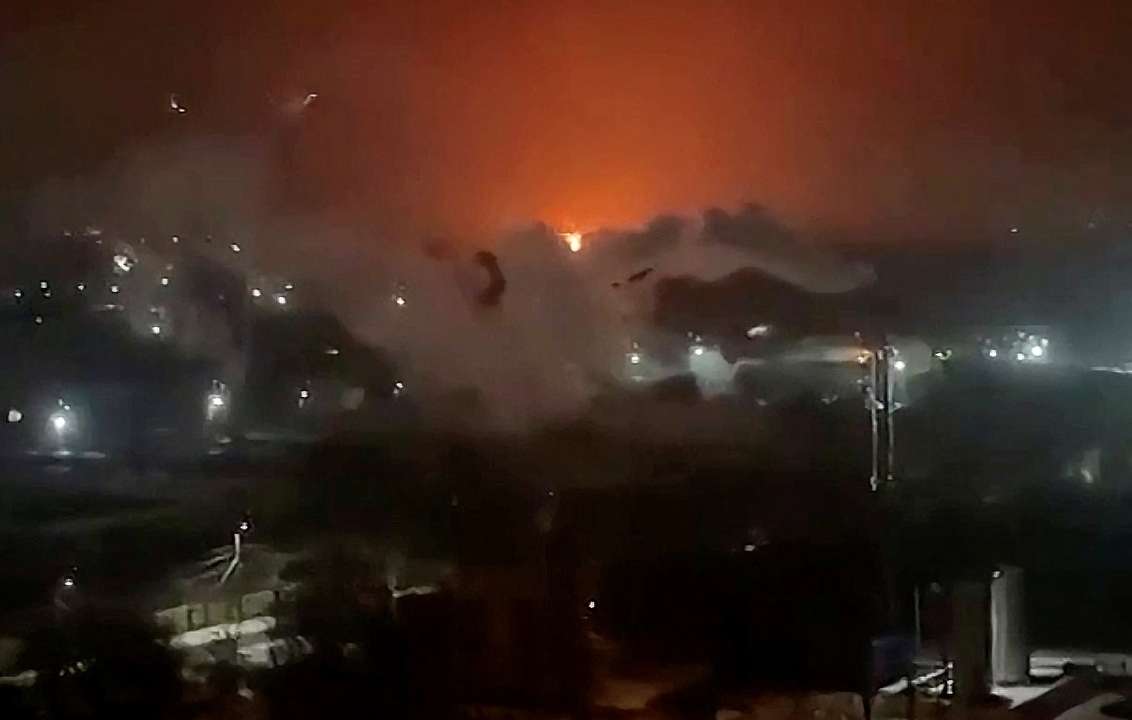 Fire and smoke rise from an oil depot in Russia's Bryansk
