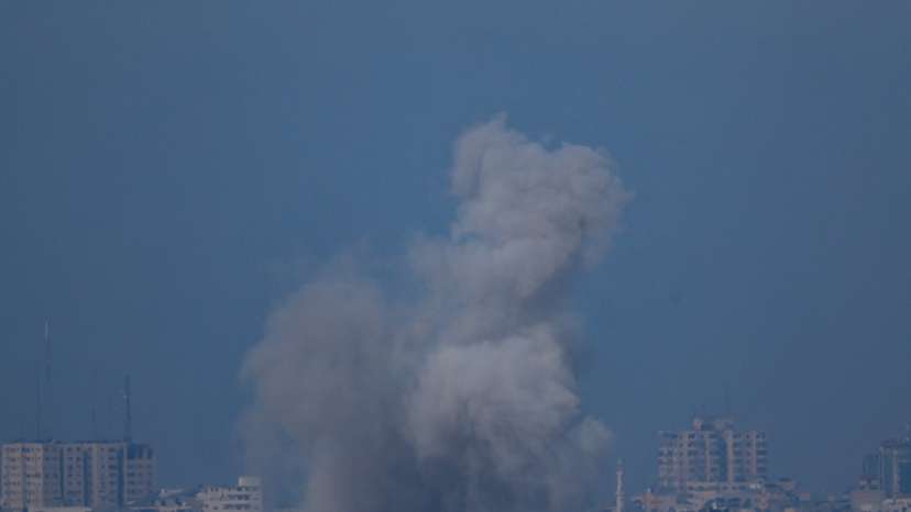 Smoke rises above Gaza, as seen from Southern Israel