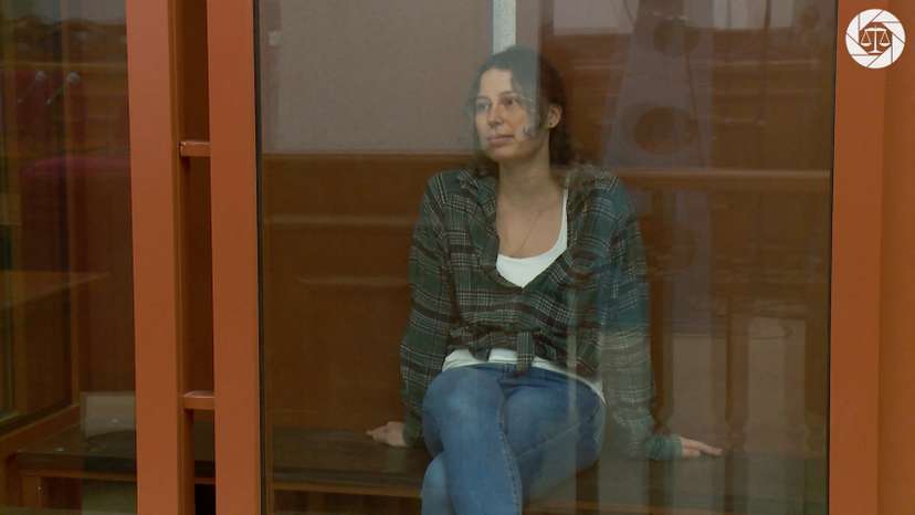Ksenia Karelina, a dual U.S.-Russian national detained on suspicion of treason, attends a court hearing in Yekaterinburg
