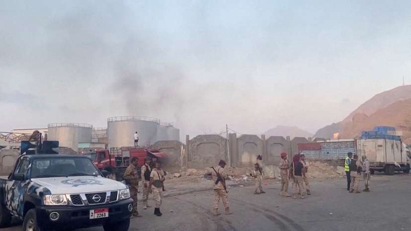 Smoke rises in Yemeni port of Mukalla following Saudi-led coalition strike on military shipments