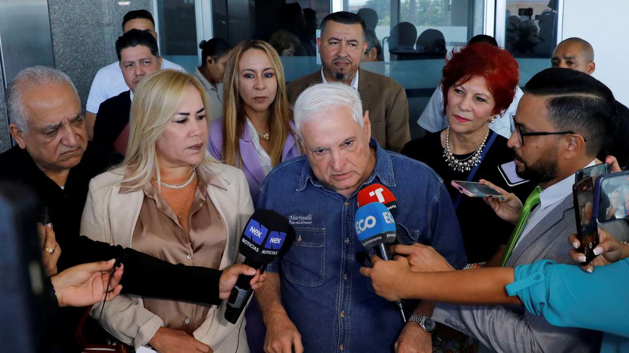 Panama's former President Ricardo Martinelli addresses the media while leaving the National Assembly, in Panama City