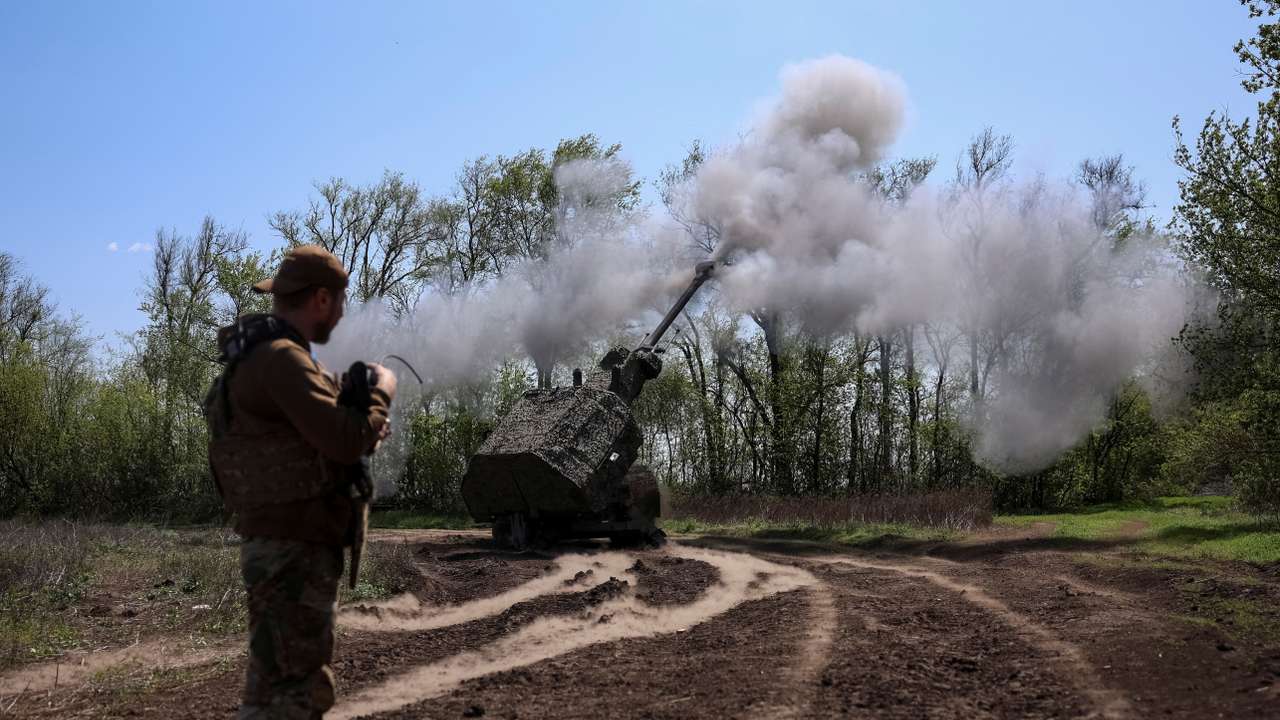 Ukrainian servicemen fire an Archer self-propelled howitzer towards Russian troops at a position in Zaporizhzhia region