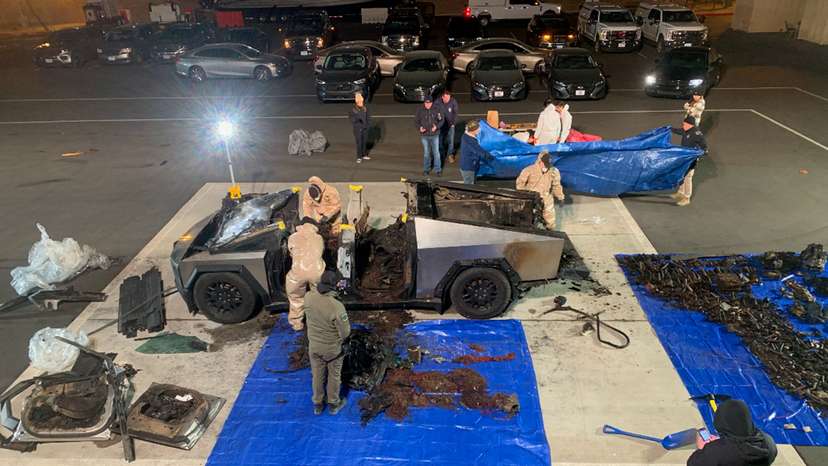 Investigators inspect the burned Tesla Cybertruck, which the police say was driven by Matthew Livelsberger