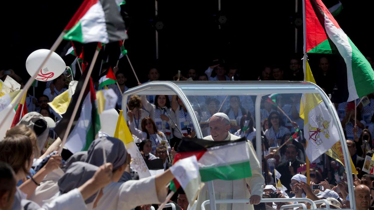 FILE PHOTO: Pope Francis arrives to celebrate mass in Manger Square next to the Church of the Nativity, believed by many to be the birthplace of Jesus Christ, in the West Bank city of Bethlehem