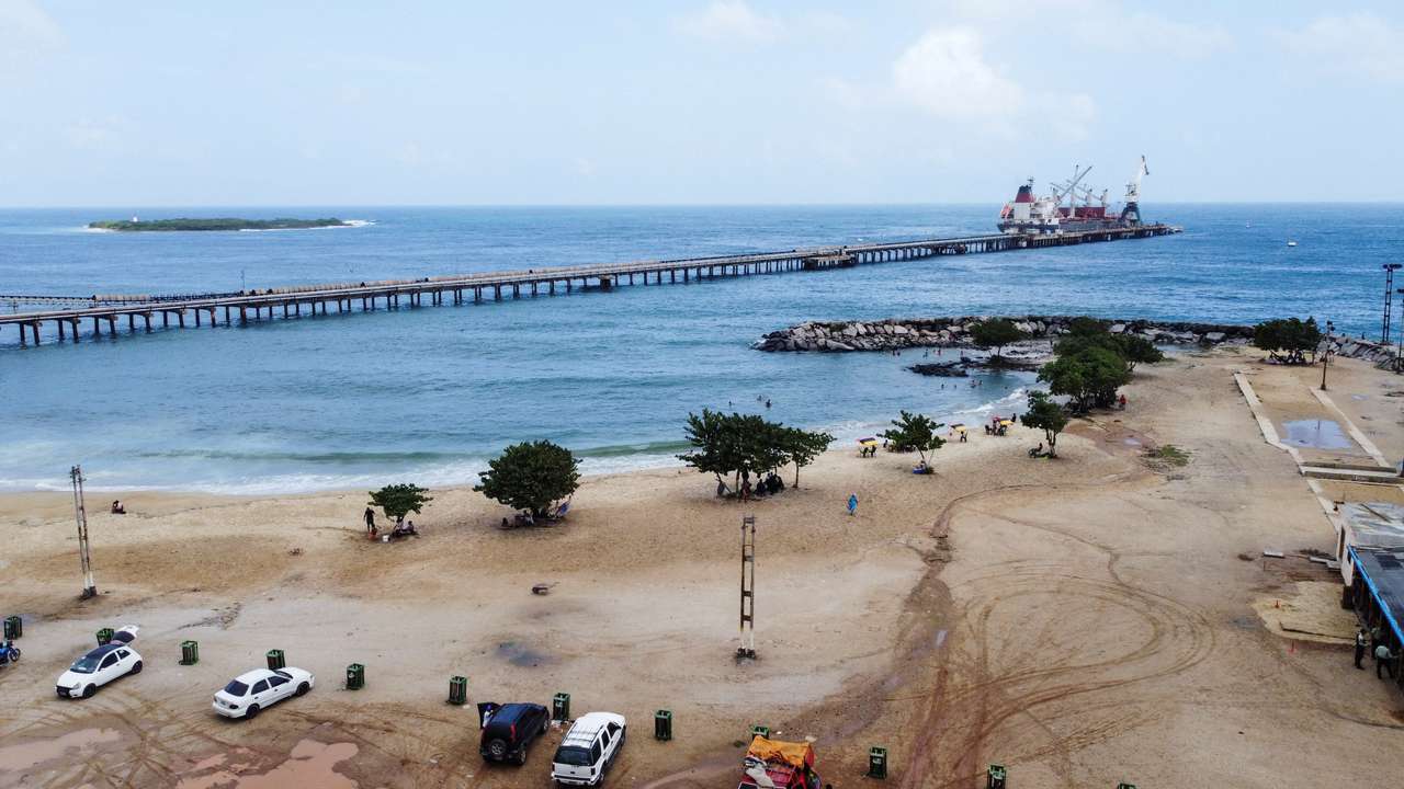 FILE PHOTO: The docks of the Venezuelan state oil company PDVSA subsidiary are seen on the Waikiki beach, in Puerto Cabello