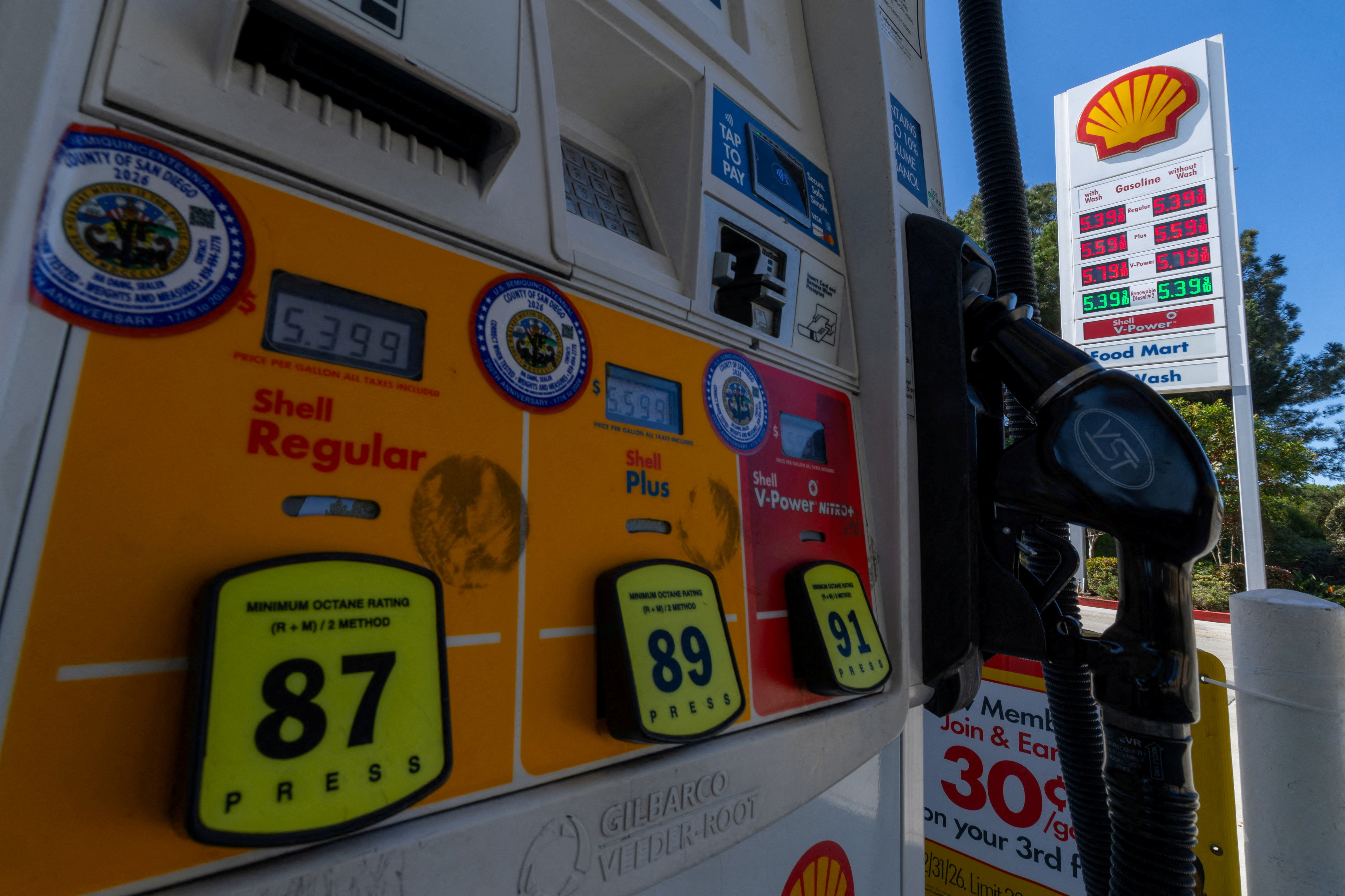 FILE PHOTO: Gasoline prices are displayed on a gas pump in Del Mar, California