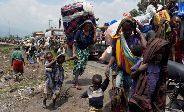 FILE PHOTO: Thousands more flee rebel advance in eastern Congo