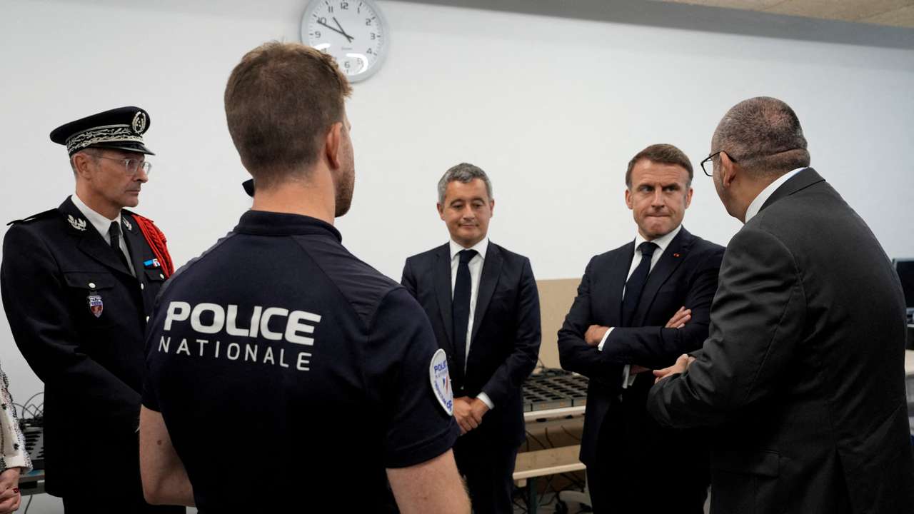 FILE PHOTO: French President Emmanuel Macron visits the Olympic village in Paris
