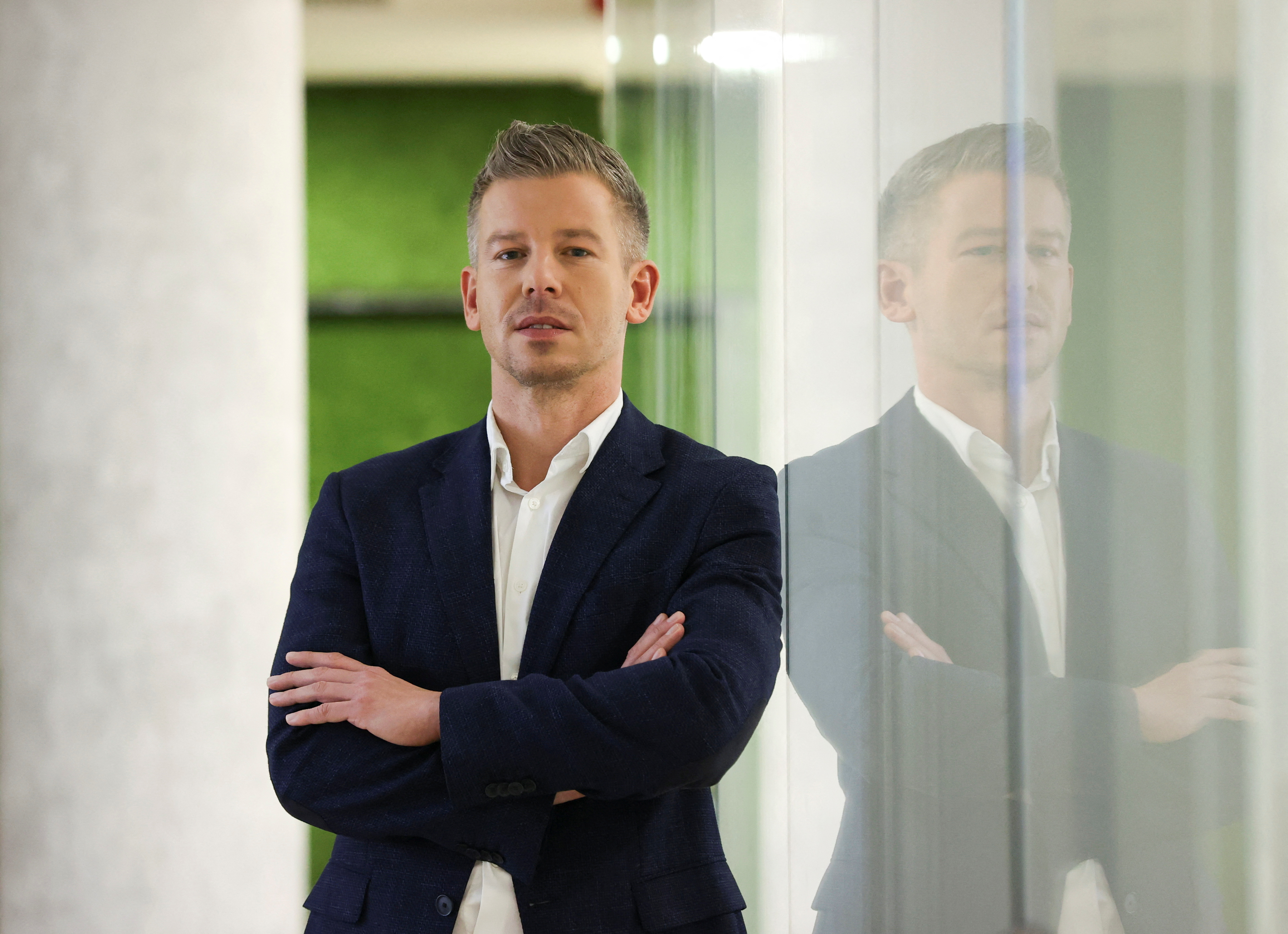 Magyar leader of opposition TISZA party poses for a picture in Budapest