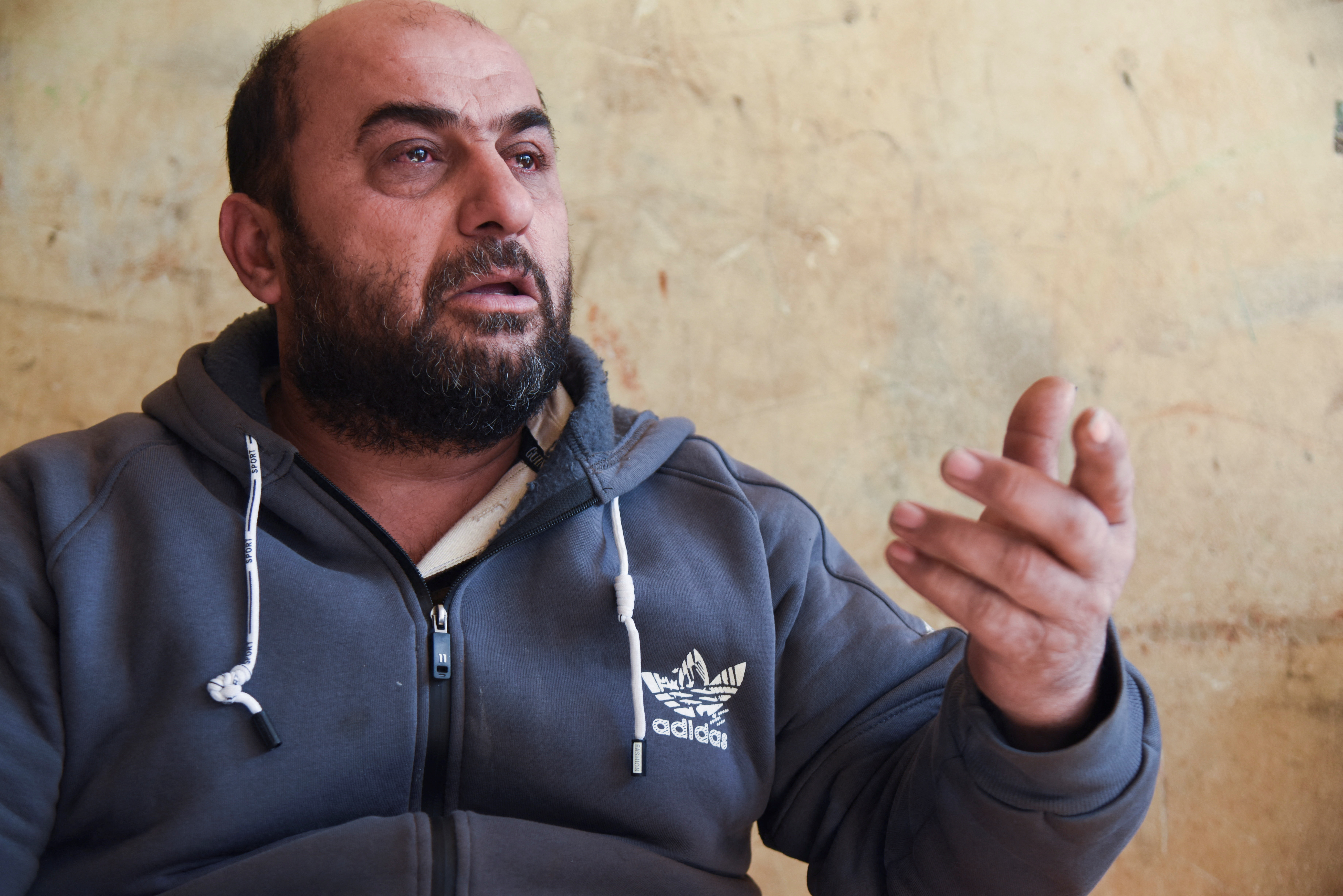 Muammar Al-Ali, gestures during an interview with Reuters in Berqayel