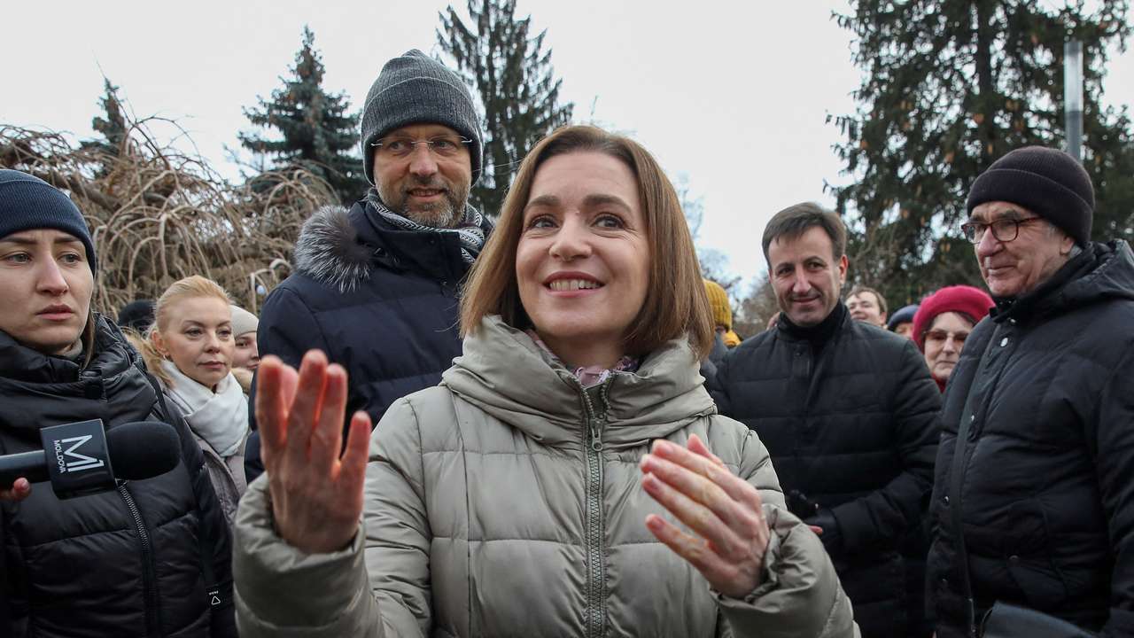 FILE PHOTO: Moldovans celebrate decision to open membership talks with EU