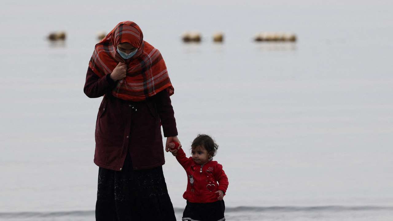 Afghan migrants are seen as they hope of going to the U.S., in the coastal town of Shengjin